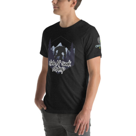 Hide N Seek Champ - Sasquatch / Bigfoot - Forest and Mountains Scene - Unisex Soft T-Shirt - Heather Black - Cryptid & Kin - Side View