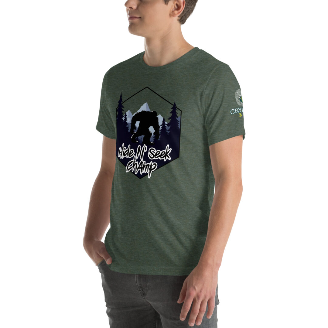 Hide N Seek Champ - Sasquatch / Bigfoot - Forest and Mountains Scene - Unisex Soft T-Shirt - Heather Forest Green - Cryptid & Kin - Side View