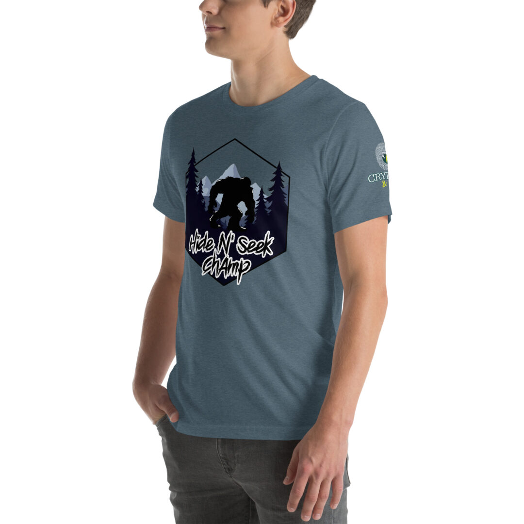 Hide N Seek Champ - Sasquatch / Bigfoot - Forest and Mountains Scene - Unisex Soft T-Shirt - Heather Slate - Cryptid & Kin - Side View